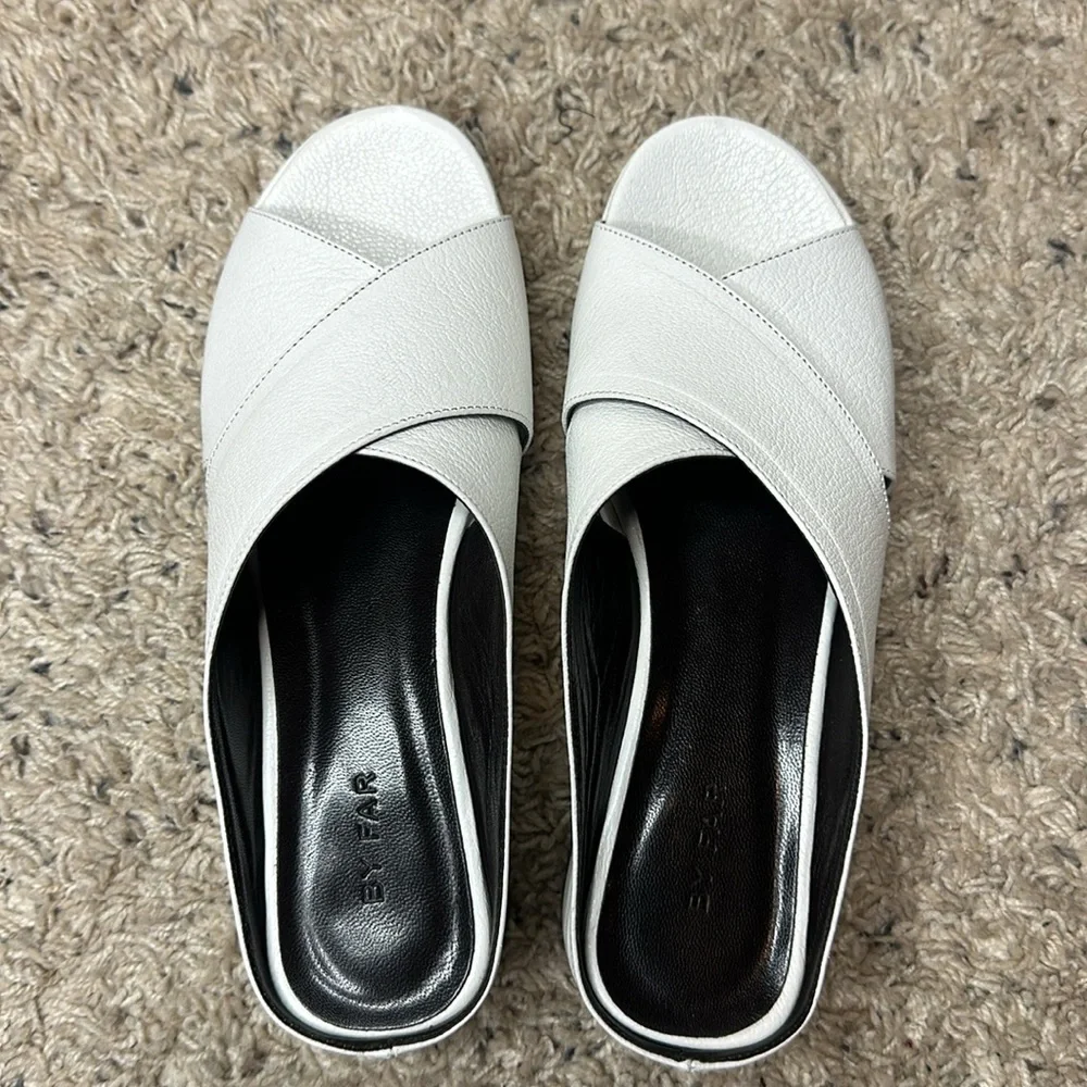 By Far Iggy Mules cross-front platform sandals in white leather